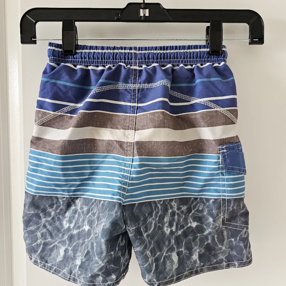3T Quad Seven blue, gray and white swim trunks Vacation Spring Break beach shore